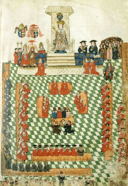Henry-VIII-in-Parliament-in-1523-–-Note-Cardinal-Wolsey-to-his-right-red-hat