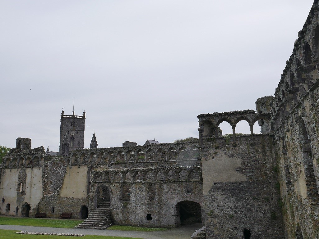 The East Range Of The Palace With The Cathedral Tower Beyond © Tudor Times Ltd 2019